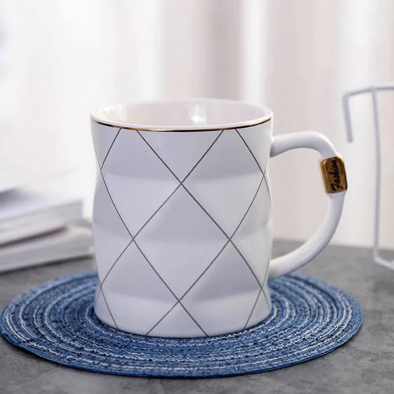 Gold painted black and white lattice ceramic cup - Bellarte Enchanté Gold painted black and white lattice ceramic cup